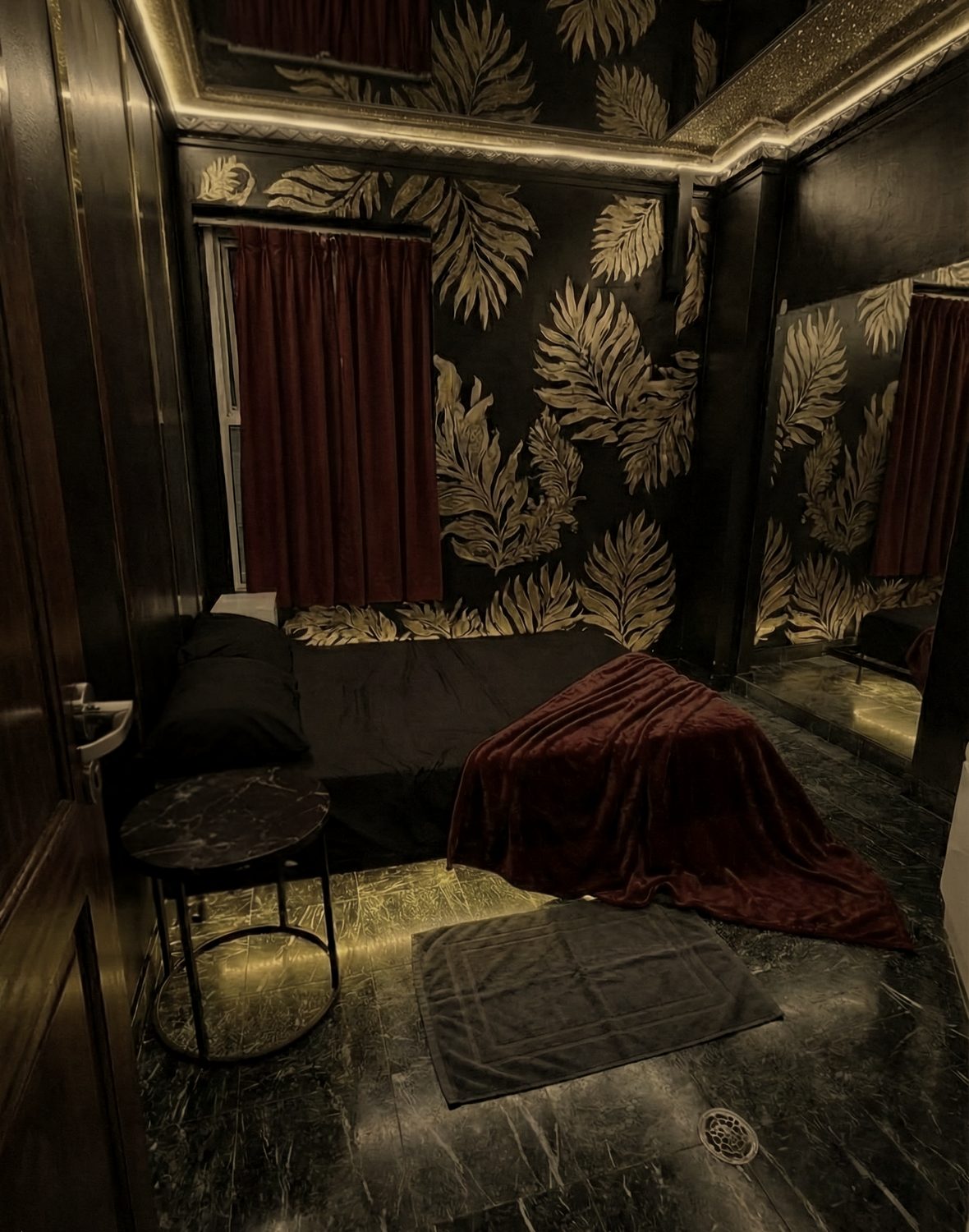 Guest room three at The Black Garter, dark timber and low light
